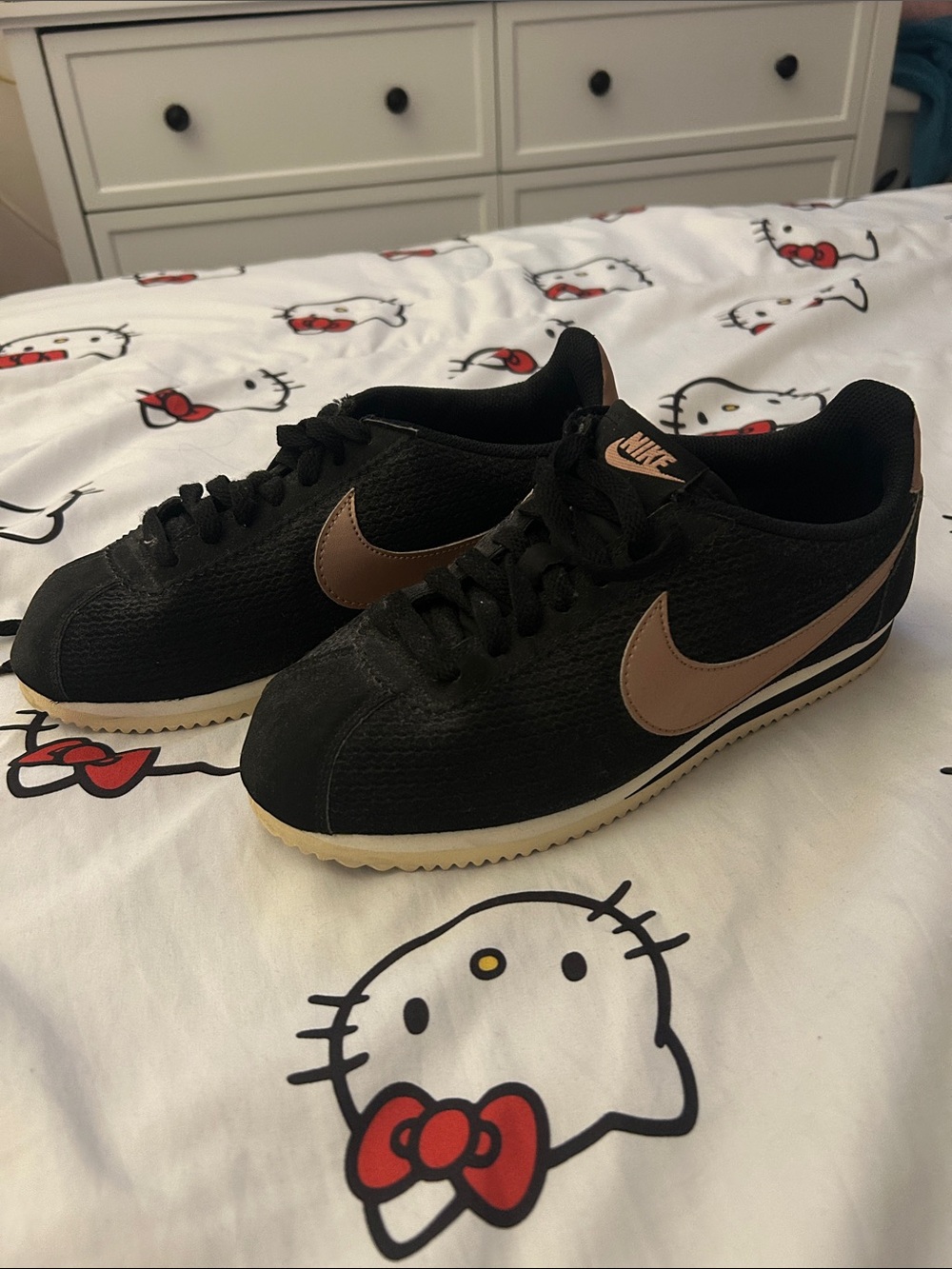 Nike Black Low-Top Sneakers with Bronze Swoosh